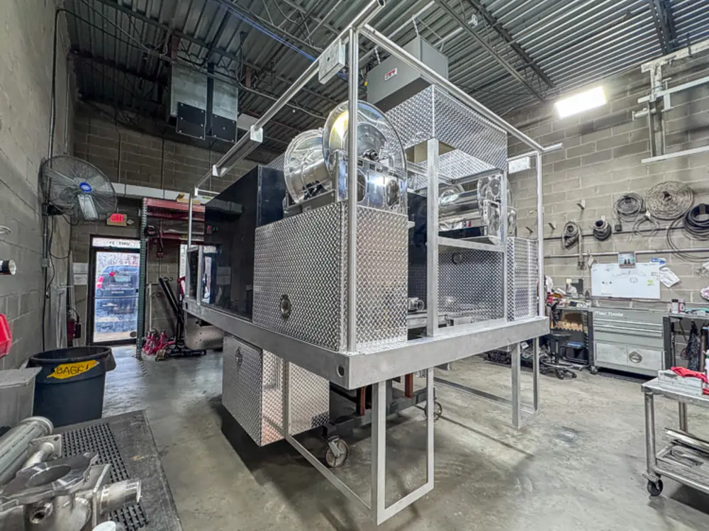 Apparatus in production bay with hood open, photo 111 of 303.